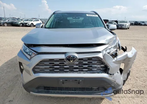 2019 Toyota Rav4 Limited from USA, damaged, VIN 2T3Y1RFV5KC011082